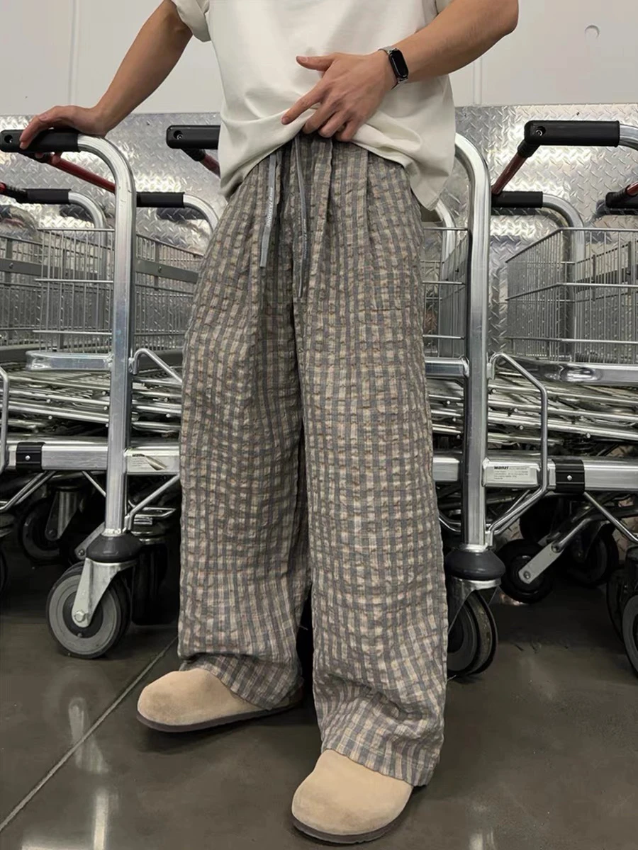 Pantaloni scozzesi in tessuto a bolle retrò americano Pantaloni larghi da uomo a gamba larga casual per il tempo libero Colore caffè Pantaloni versatili per il pendolarismo quotidiano