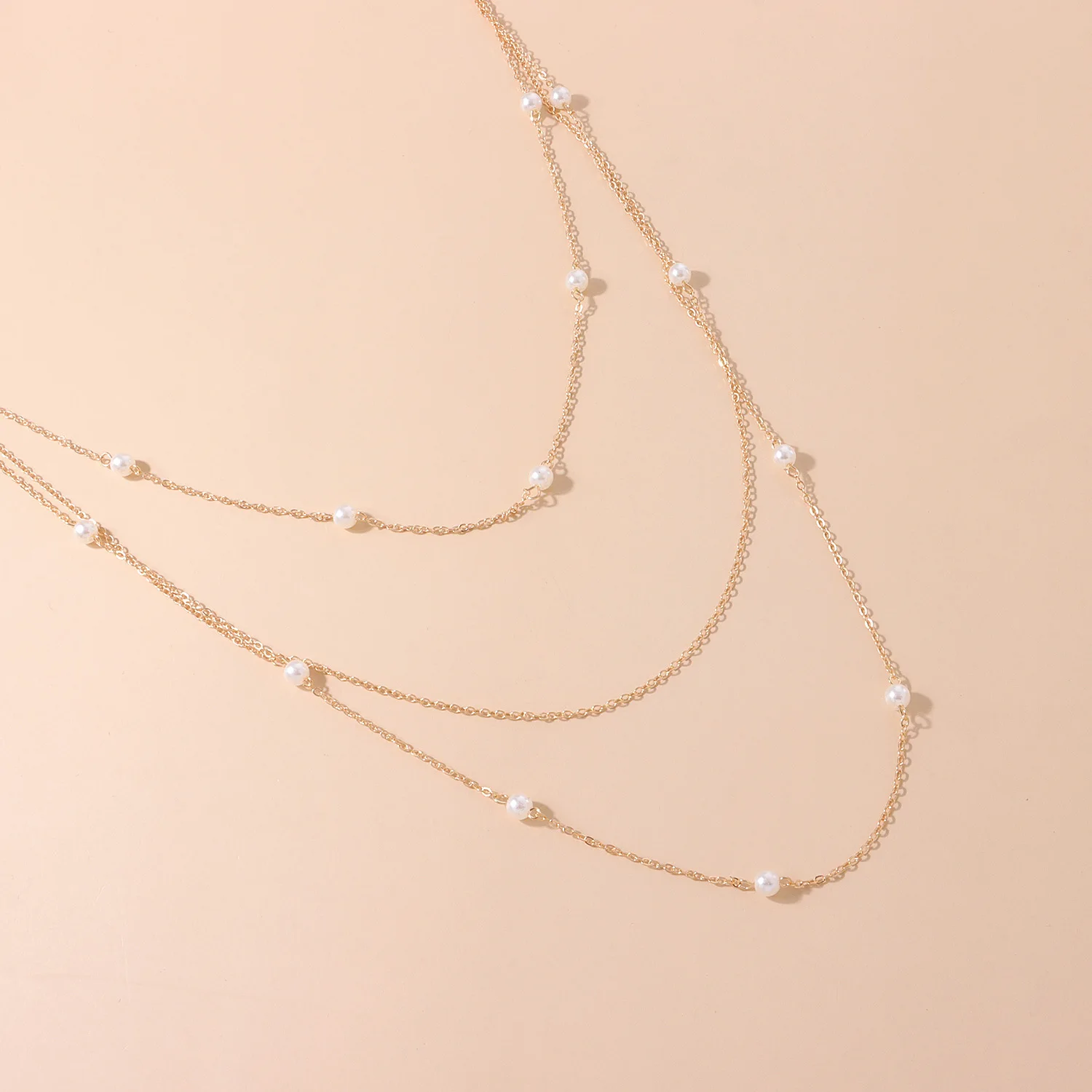 Long autumn and winter elegant pearl layer necklace women's geometric trend sweater chain wholesale