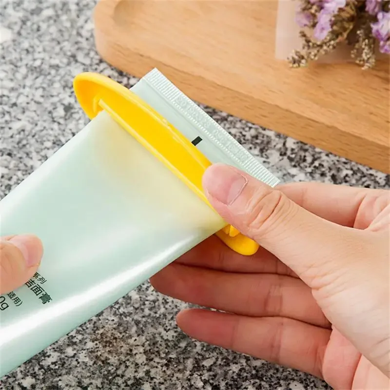 Toothpaste Squeezer Tooth Paste Holder Oral Care Bathroom Tools Tube Cosmetics Press Facial Cleanser Rolling Squeezing Dispenser