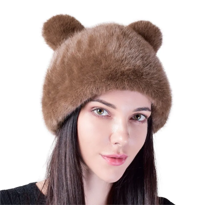 The fur hat for women artificial with a cover and ears is very cute