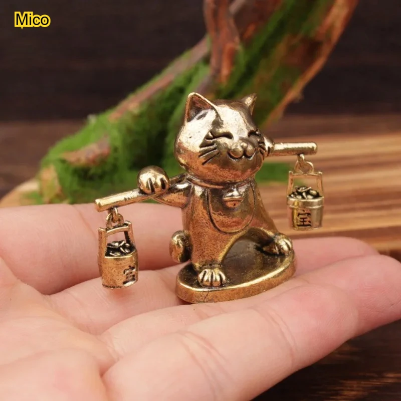 

Brass carrying a bucket of gold to attract wealth, cat housewarming gift, living room TV cabinet, cashier decoration