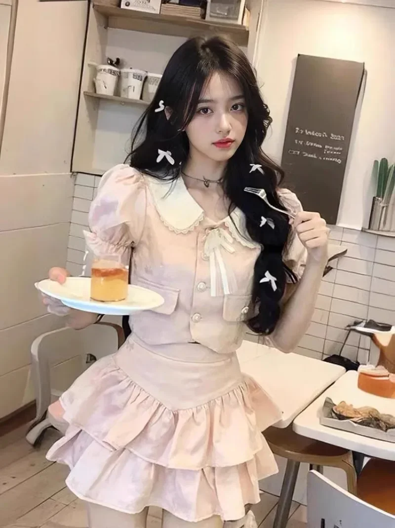 Korean Sweet Doll Collar Top Cake Skirt Two-piece Set Women Bubble Sleeve Single Breasted Ruffle Edge Splice College Summer Wear