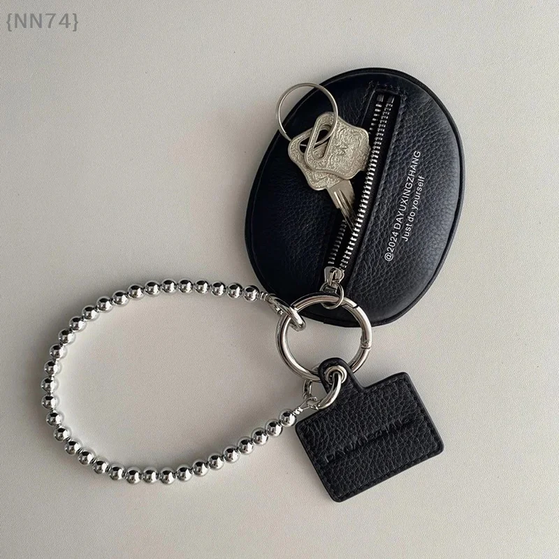 Modische Geschenkidee: Taschenanhänger aus schwarzem PU-Leder |   Strukturierter Schlüsselanhänger mit integriertem Schlüsseletui und Münzgeldbörse, funktionell