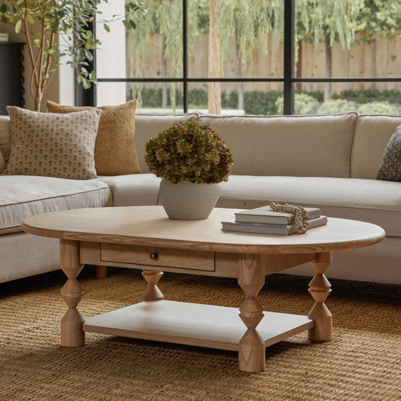 Aged oval vintage solid wood coffee table in original wood color