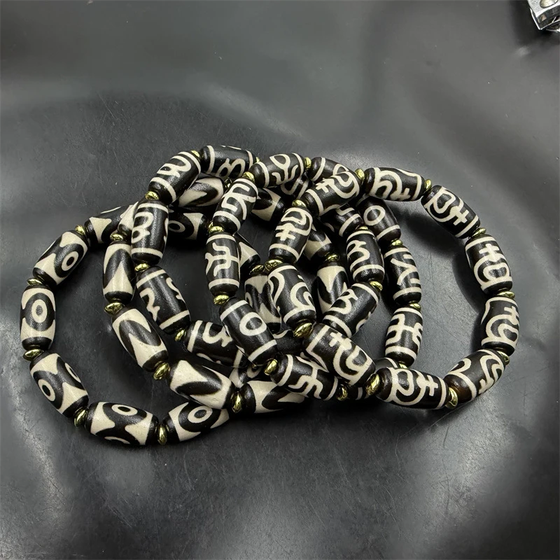 

Винтажный браслет с бусинами Дзи, патиной, агатом, тигровым зубом, трехглазой вазой-сокровищницей и Богом богатства