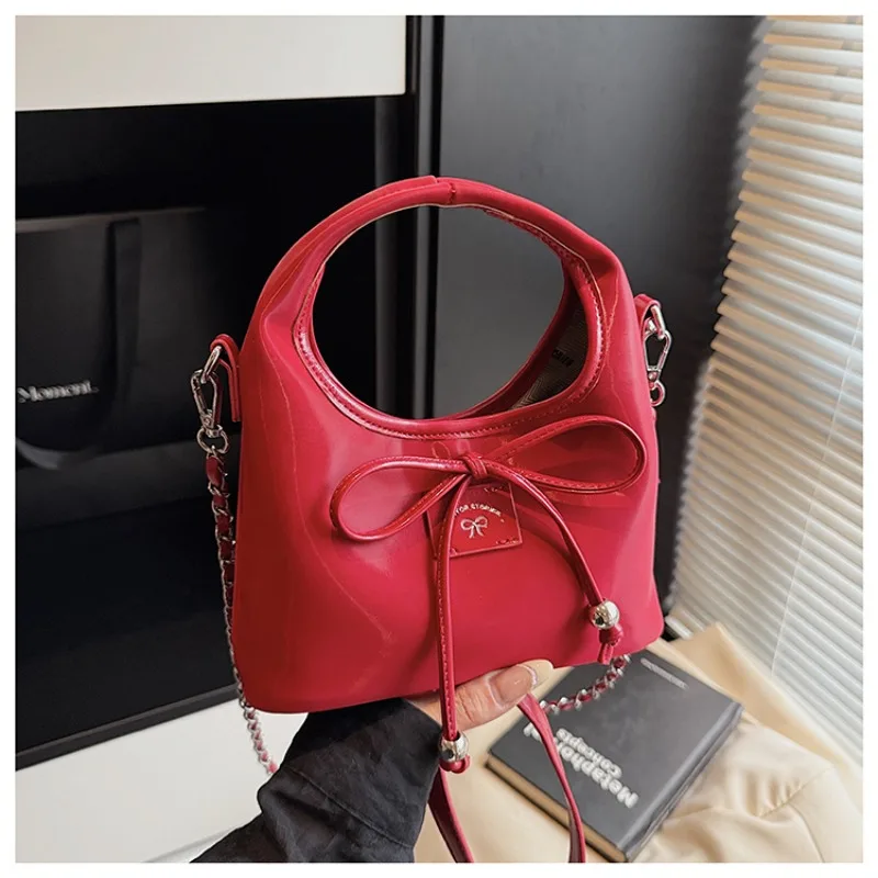 

Сплошной цвет, изысканные сумки на плечо из искусственной кожи с застежкой и бантом, новинка лета 2025, горячая распродажа, женские сумки, милые универсальные женские сумки через плечо