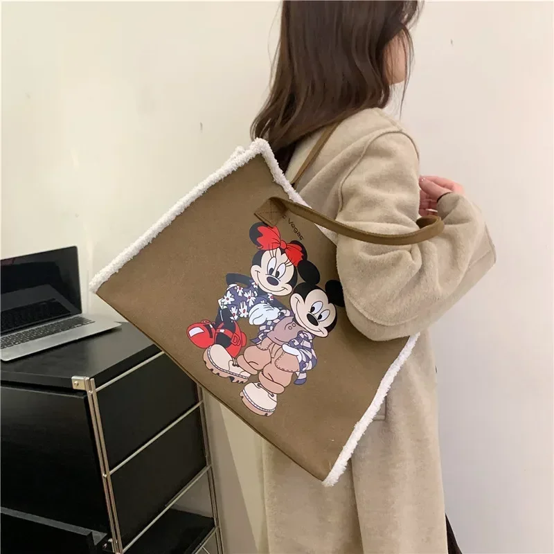 

Disney Canvas Shoulder Bag Minnie Mouse Women fashion New Autumn Winter Large Capacity Commuter Bag Cartoon Tote Bag 39x29x18cm