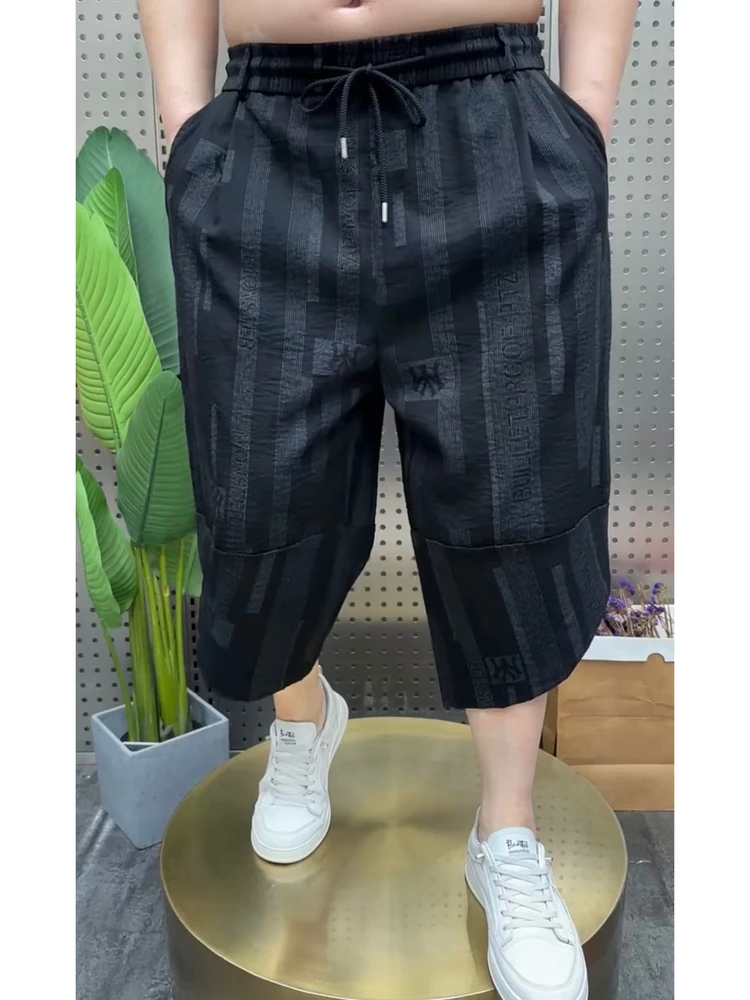 

Men's Summer Fashion Plaid Loose Cool Feeling Breathable Harlan Wide Leg Shorts Elastic Versatile Seven-Quarter Length Pants