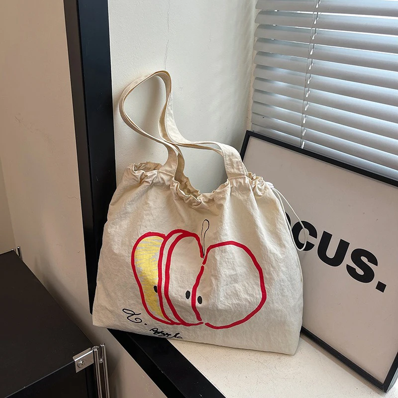 

Summer New Korean-style Drawstring Nylon Single-shoulder Tote Bag, Ins Red and White Contrasting Apple Slice Commuting Handbag