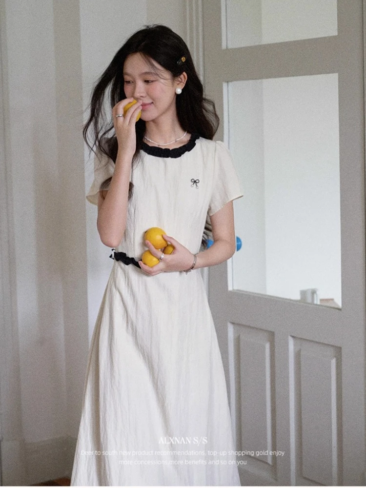 ALXNAN Beige Short Sleeve Dress with Bow Detail Black Lace Trim Pearl Buttons Waist-Defining A-Line Silhouette Summer DYL661967