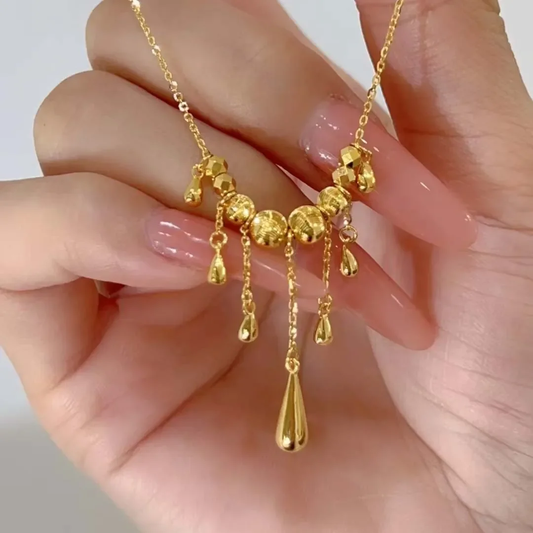 Cat-eye tassel drop pendant necklace for women, light luxury and simple design, laser-cut beads, elegant and delicate, 9999gold