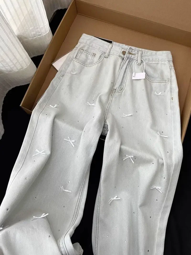 

2024 new light blue bow jeans women's autumn loose wide-leg design sense chic straight trousers tide