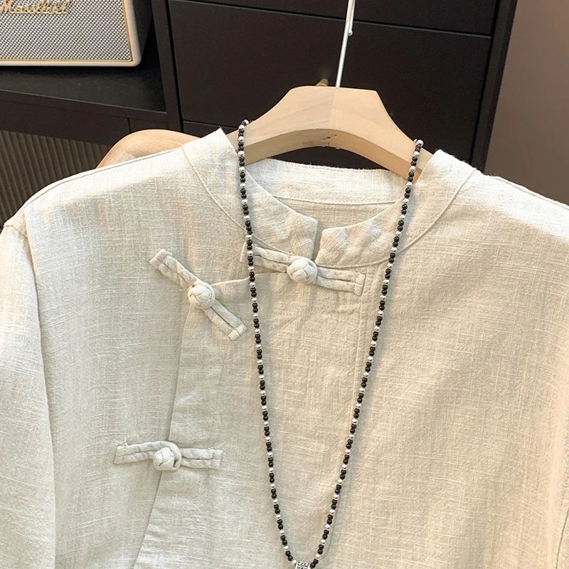 ربيع جديد Sle فضفاض طويل Sve القطن الكتان irt الرجعية زر الوقوف طوق الجانب زلة الشاي زي تي شيرت لون نقي العصرية