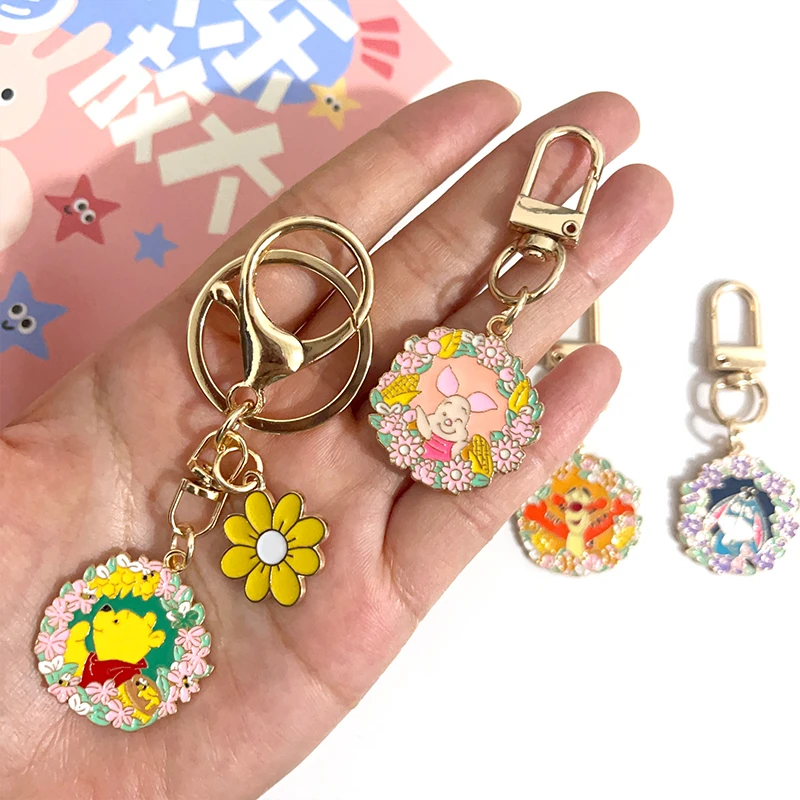 Disney Pooh Bear Piglet Tigger flor corona diseño dibujos animados llavero de Metal bolsa de maquillaje cremallera decoración colgante regalo de cumpleaños