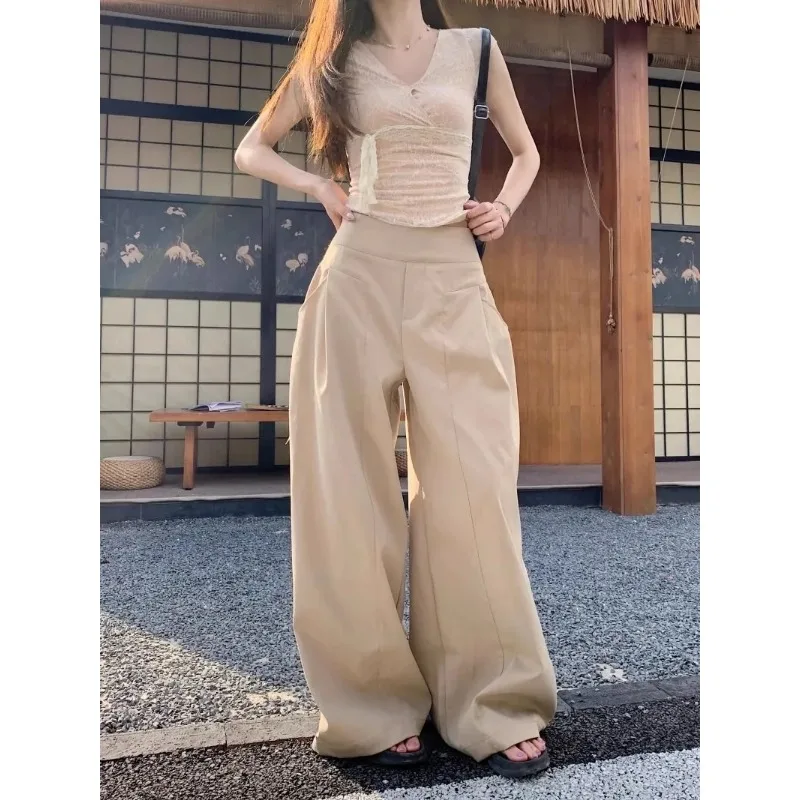 

Женские бежевые брюки с высокой талией, широкими штанинами, свободного кроя, повседневные.