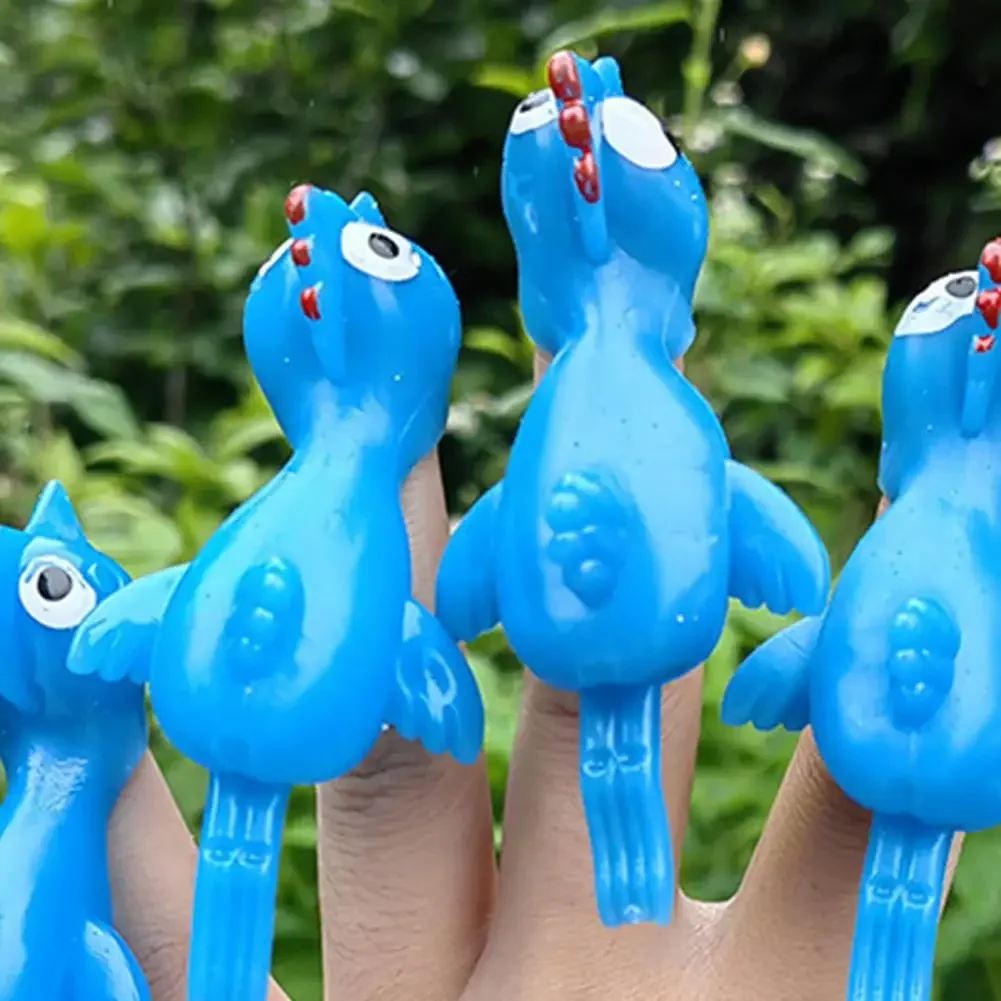 10pcs Novelty colour Catapulted Ejection Chicken Toy Light Rubber Finger Prank Flying Toy Slingshot Chicken Finger Toys Turkey