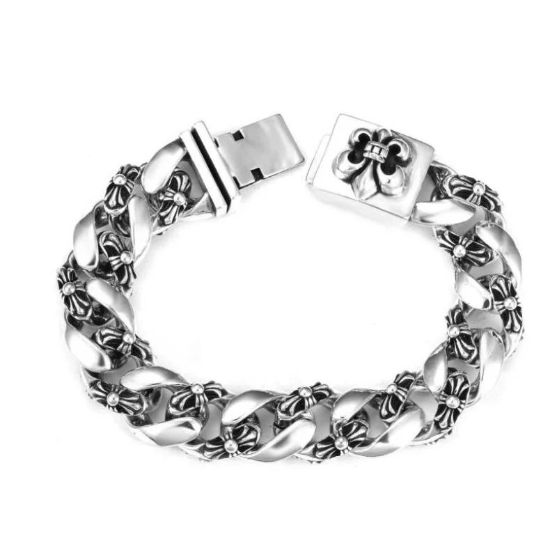 

Silver Engraved Fleur-de-lis Cuban Link Bracelet: Ornate Luxe Statement Jewelry