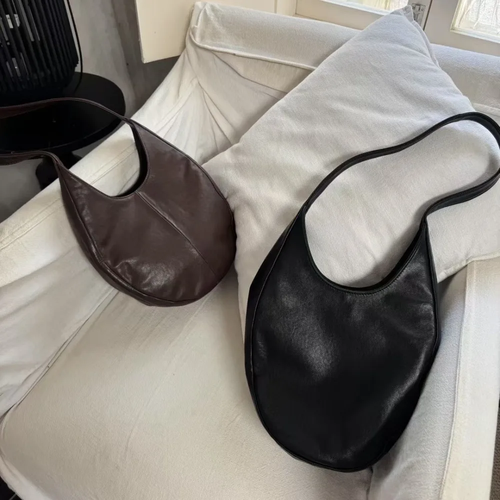 

Niche Design Vegetable Tanned Literary and Retro Egg-shaped Shoulder Bag with Unique Texture, Fashionable Simplicity and Casual