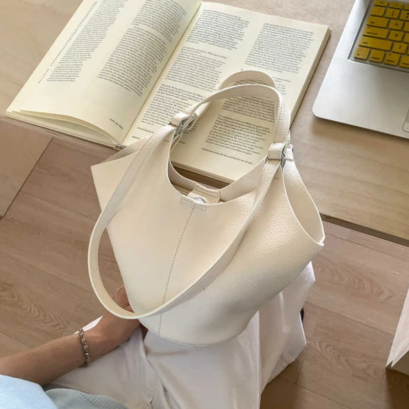 

French Style Bucket Bags Women Design Sense Casual Commute One Shoulder Bags Light Luxury Red Bridal Handbags Trend 2026