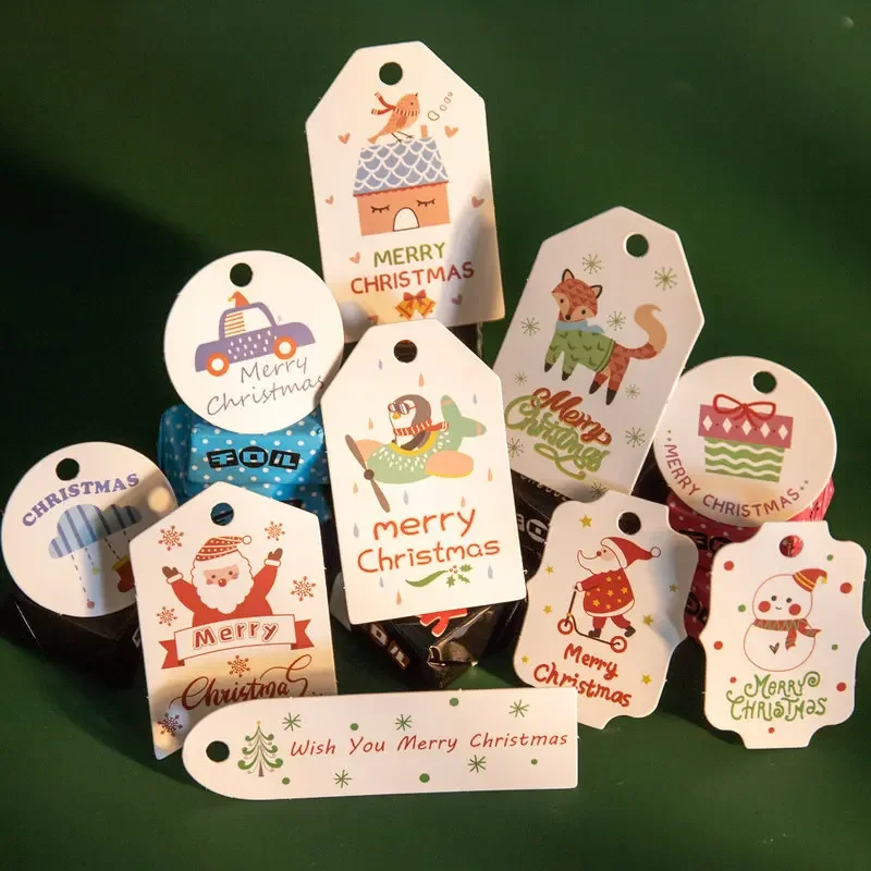 50pcs Merry Christmas Gift Tags Printed White Paper Labels Xmas Tree Hanging Decor Xmas Party Packaging Supplies Cookie Bag Tag