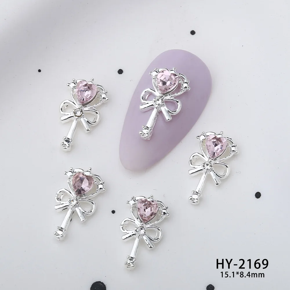 10Pcs Super Sparkling Pink Diamond Nail Charms 3D Alloy Beauty Girl Warrior Magic Stick Nail Decoration Jappen DIY Nail Supplies
