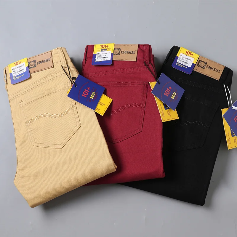 Jeans bianchi puri moda autunno da uomo elastico sottile gioventù che dimagrisce gamba dritta Business Casual pantaloni di fascia alta di mezza età maschile