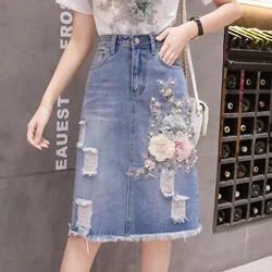 Saias jeans irregulares com bordados de diamantes, moda high-end, streetwear de todos os jogos, saia chique A-Line, oca, botão alto