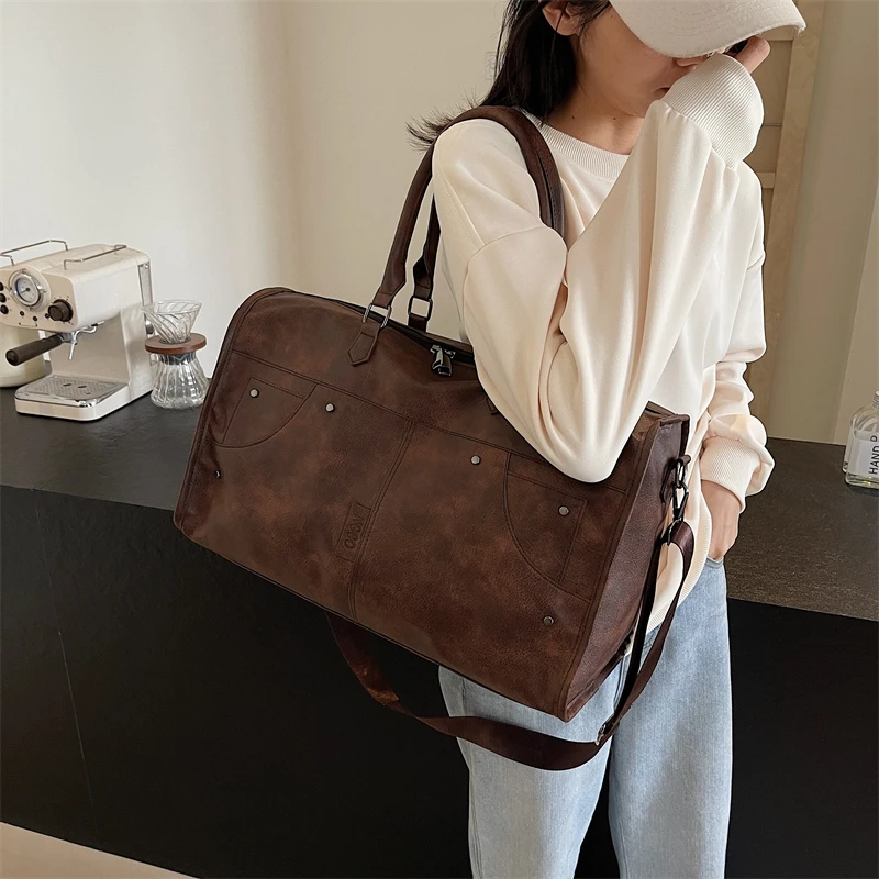 موضة بولي PU حقائب السفر سعة كبيرة جودة عالية الصلبة شعبية الخياطة الموضوع النمط الكلاسيكي حقيبة سفر للنساء 2026 جديد