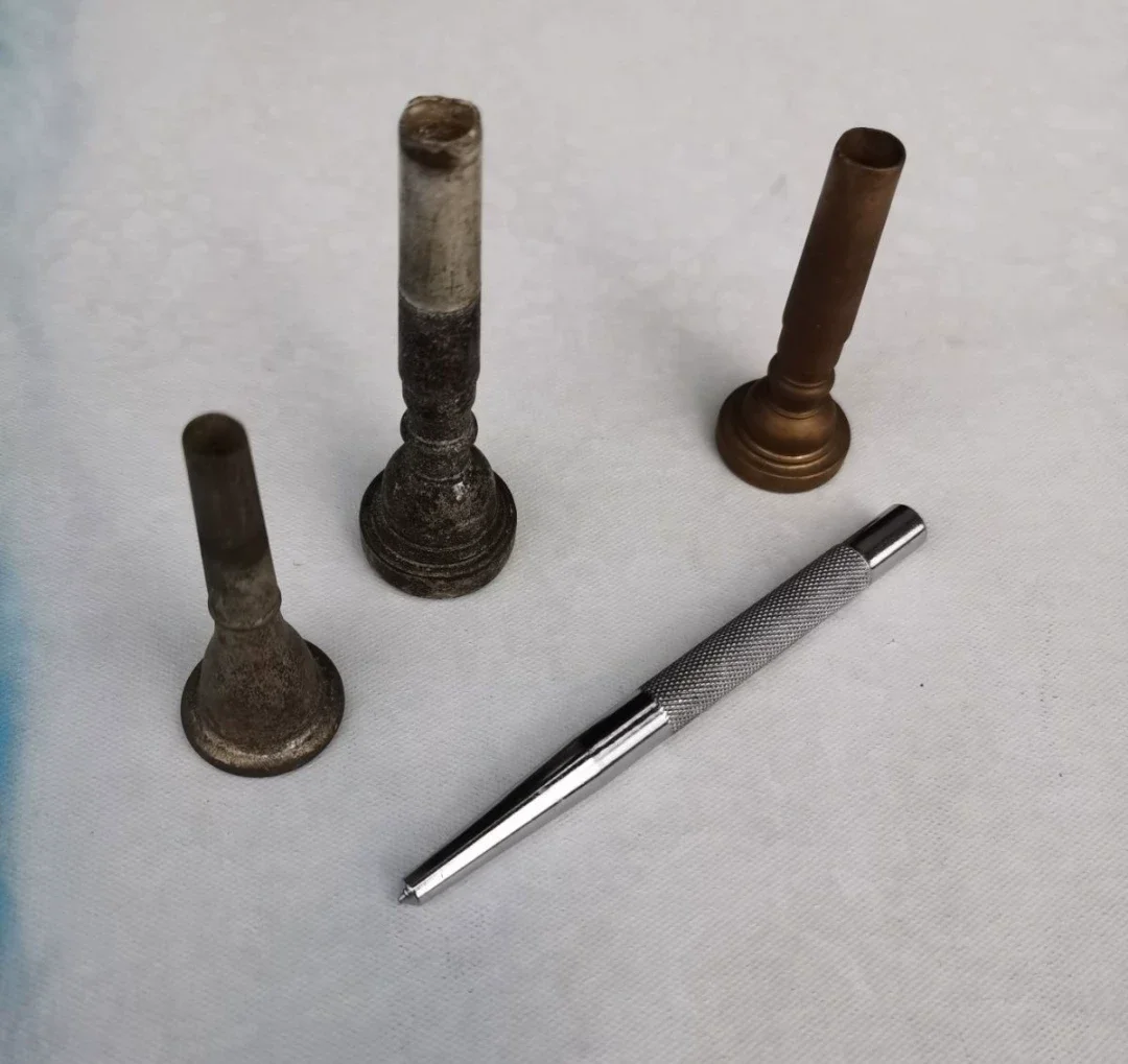Small instrument repair tool for brass instruments with flattened and deformed mouth