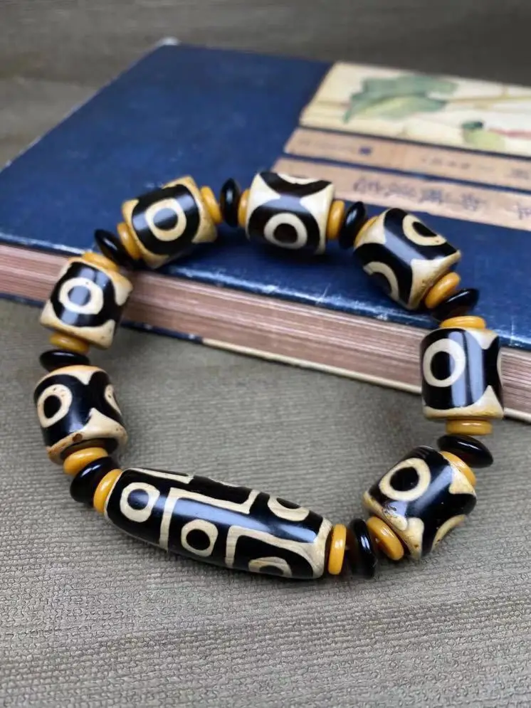 

Agate three-eyed tooth yellow dzi bead bracelet for men, versatile for friends