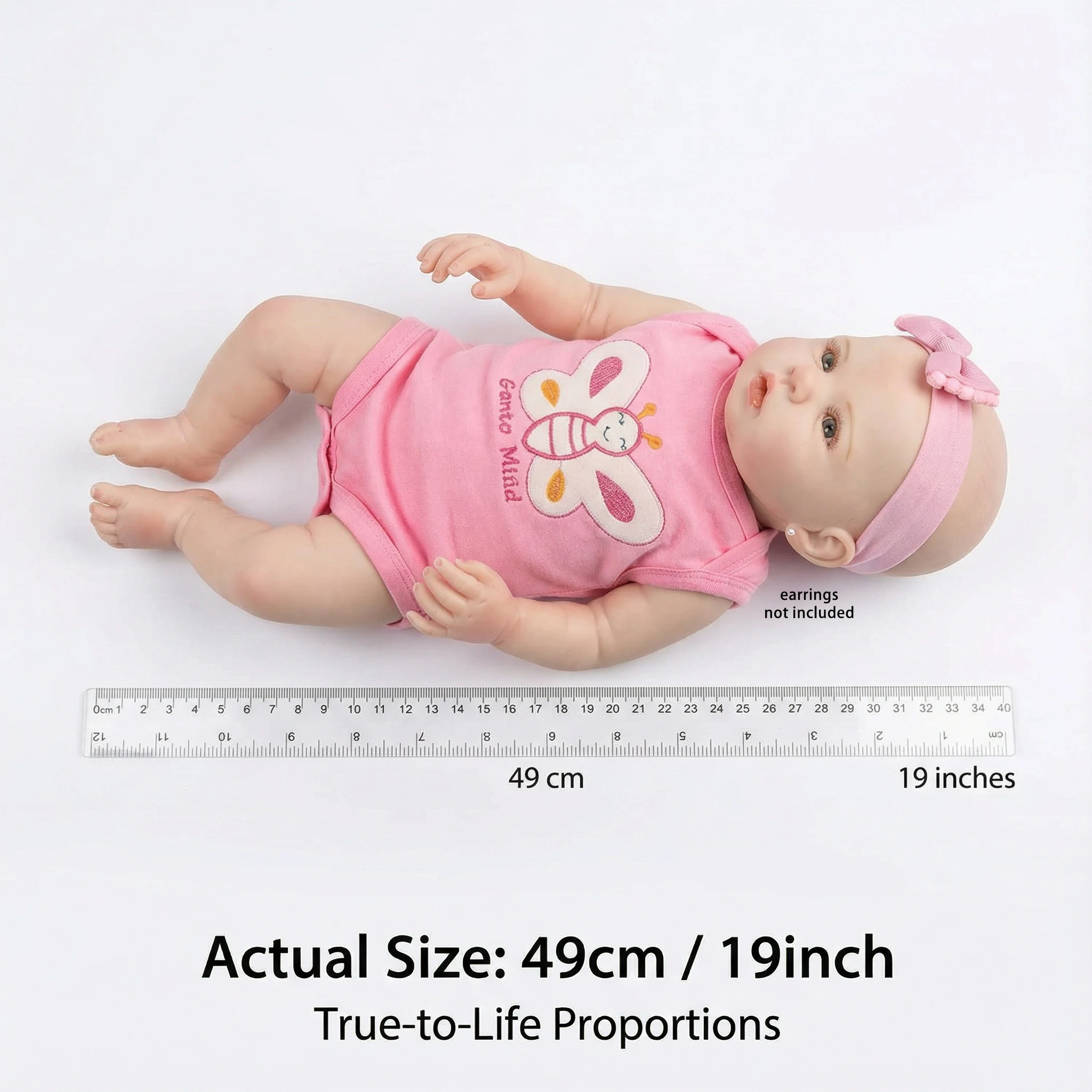 NPK 19-Zoll lebensechte wiedergeborene Kleinkind-Babypuppe Abigail mit grünen Augen Vollvinyl weicher Körper rosa Stoff Mädchenspielzeug