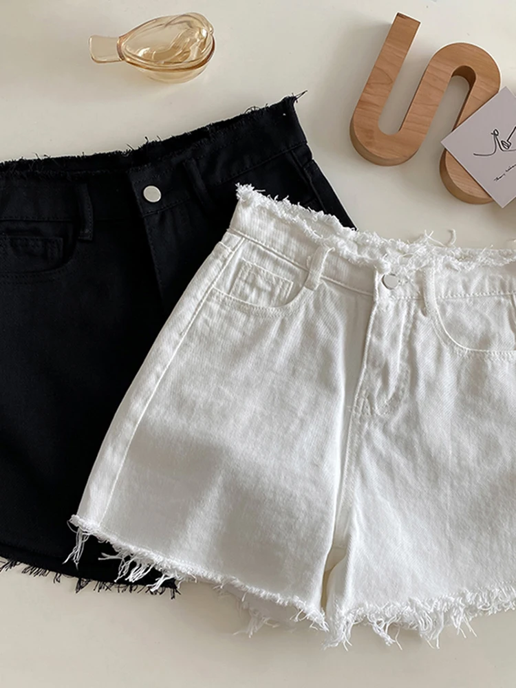 Pantalones cortos vaqueros de cintura alta para mujer, Shorts ajustados de Color sólido con bordes sin rematar, informales, versátiles, de pierna ancha negra