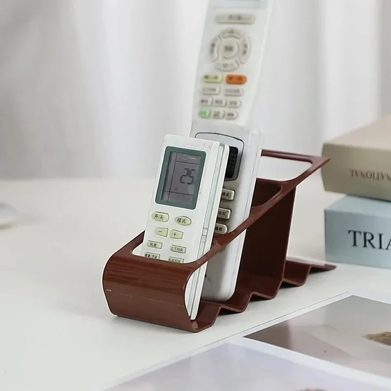 حامل جهاز تحكم عن بعد مكون من 4 فتحات، منظم مكتب بلاستيكي متين، مريح لتوفير المساحة للتلفزيون والمنزل والمكتب، رف تخزين متعدد الأغراض