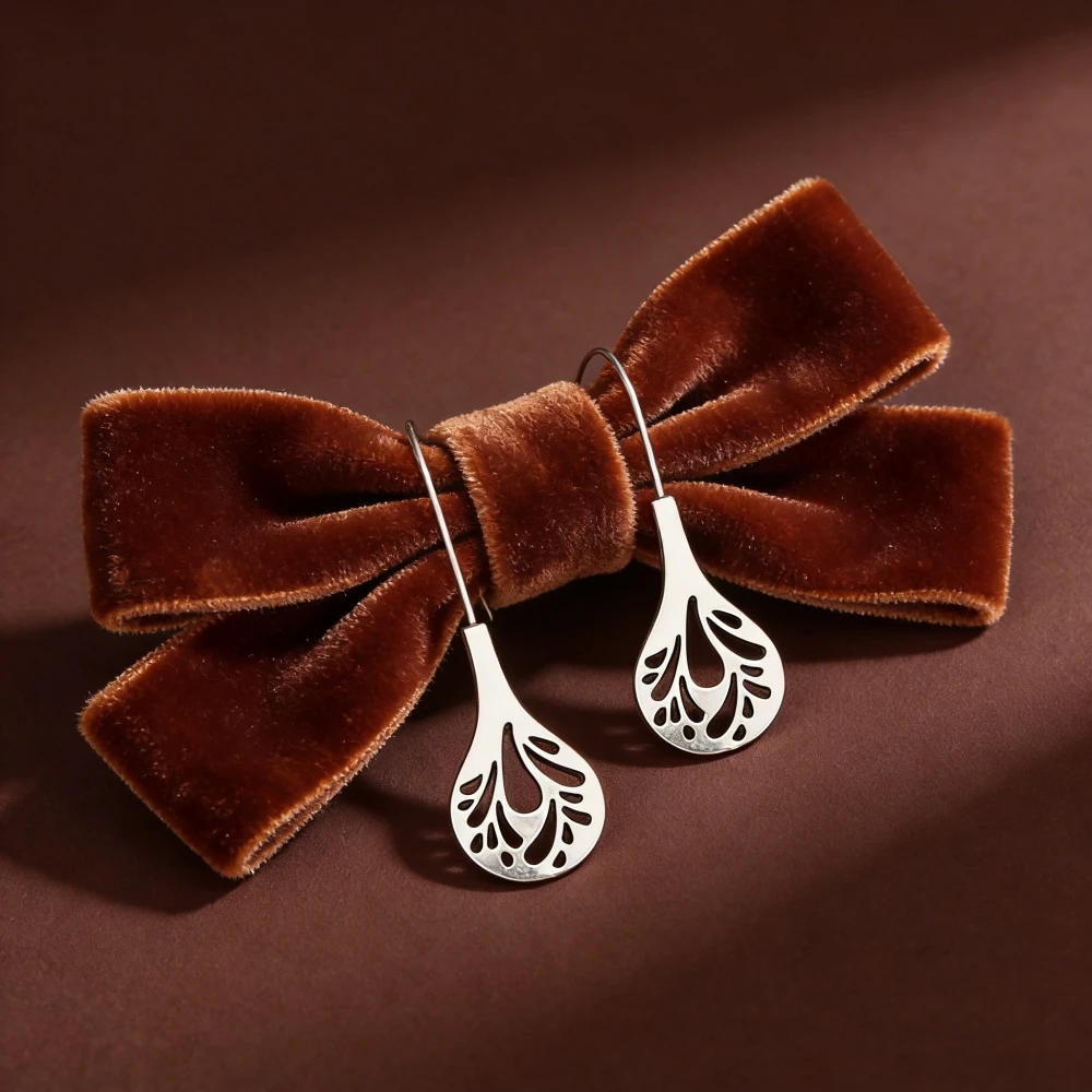 Water droplet hollowed out earrings for women, retro Thai silver patterned ear hooks, bohemian ethnic style, niche design,