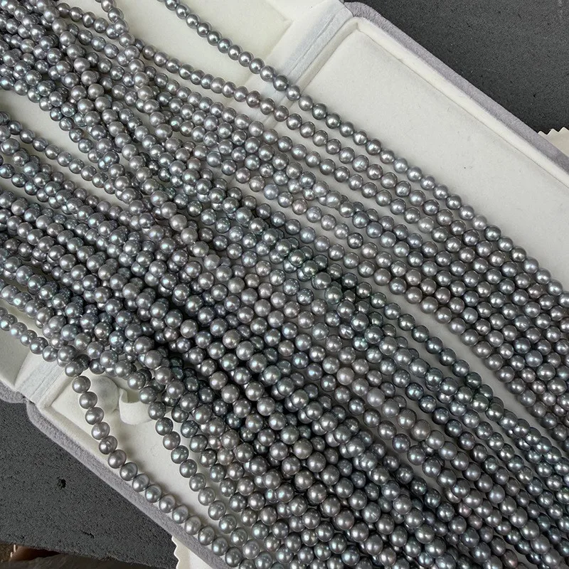5-6mm nearly circular irradiated gray freshwater DIY semi-finished products, approximately 39 cm in length, about 70 pieces.