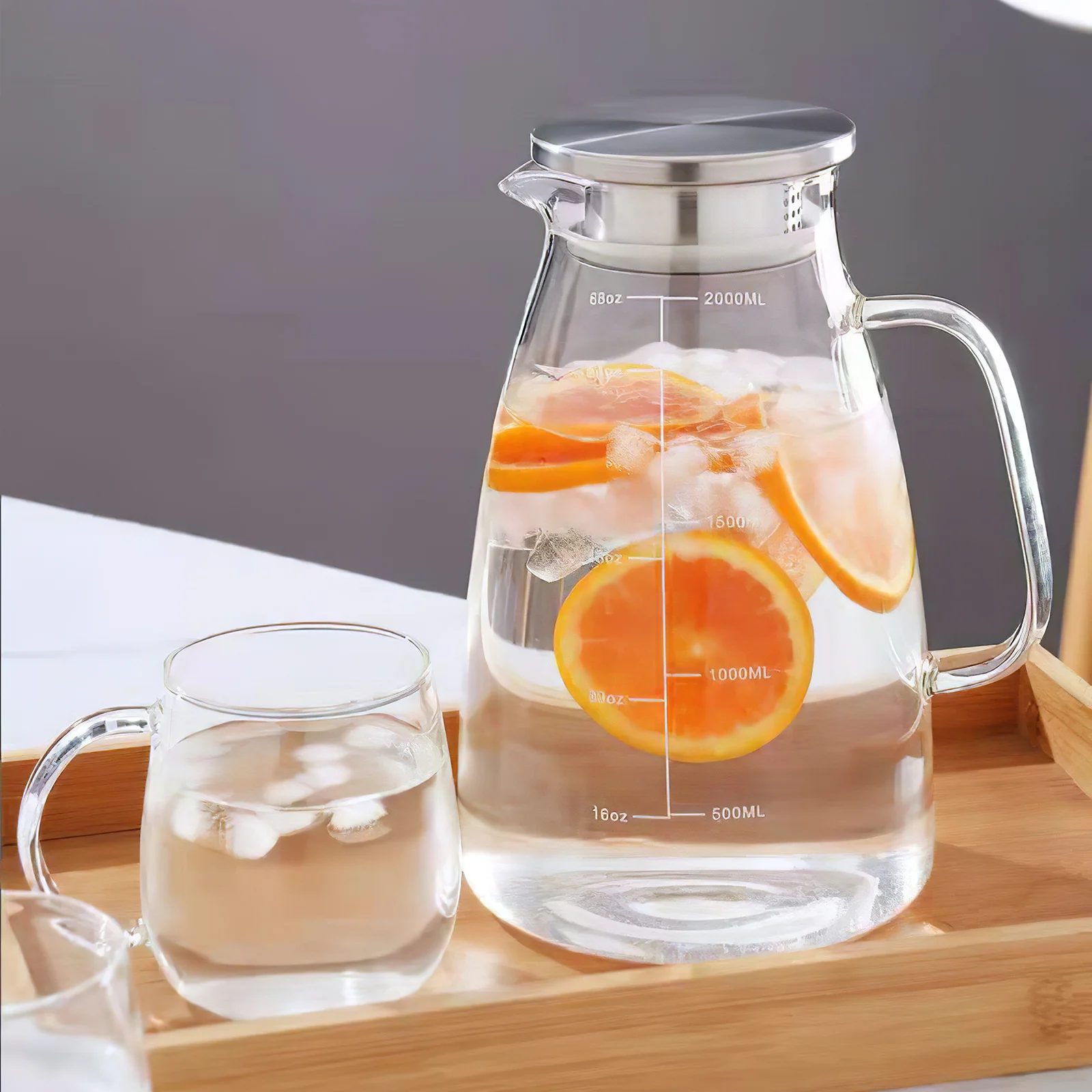 

Elegant Large Glass Water Jug for Hot Cold Drinks Milk Tea Coffee Juice Restaurant Catering Event Planning Weddings Parties