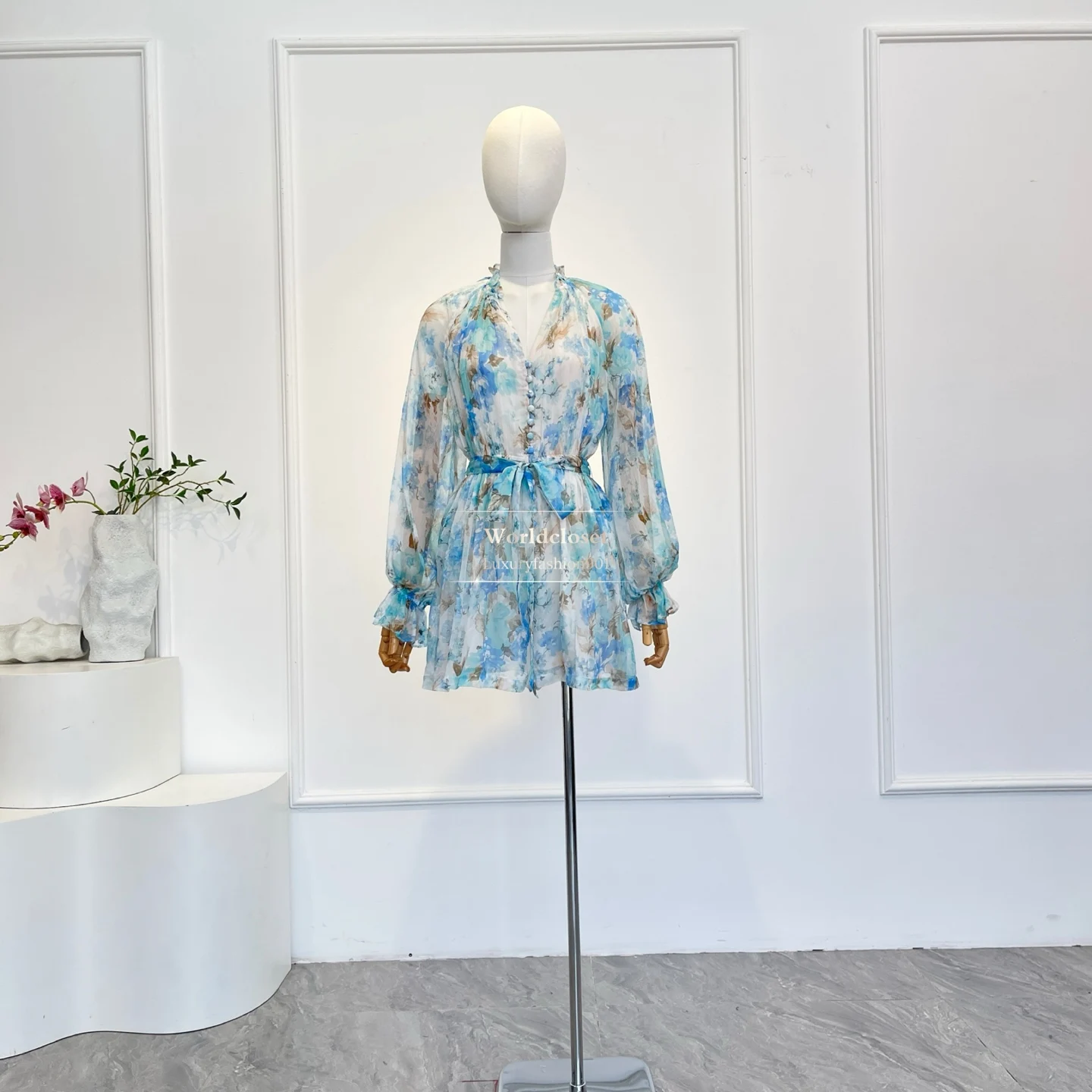 

Blue Floral Print Long Sleeve Mini Jumpsuit 2026 New Women