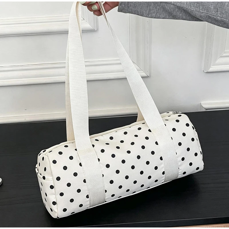 Gepunktete Schultertasche in langem Zylinderformat, Damen-Handtasche mit Tragegriff, zylindrische, leichte, schicke Tragetasche für den Arbeitsweg – Detail 16