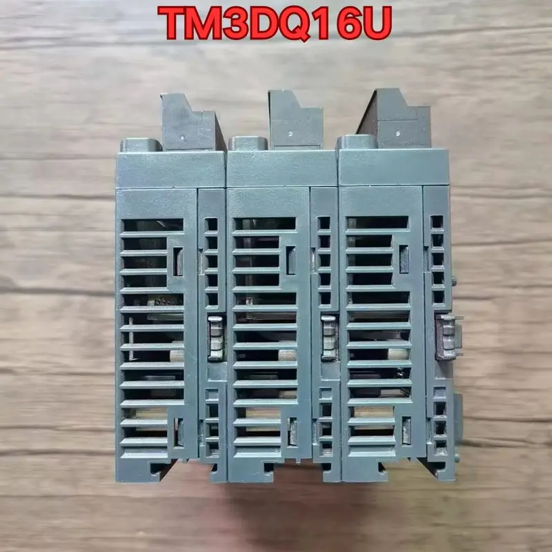Second-hand disassembled machine slightly used good condition PLC module TM3DQ16U Latest quotation in October 2025
