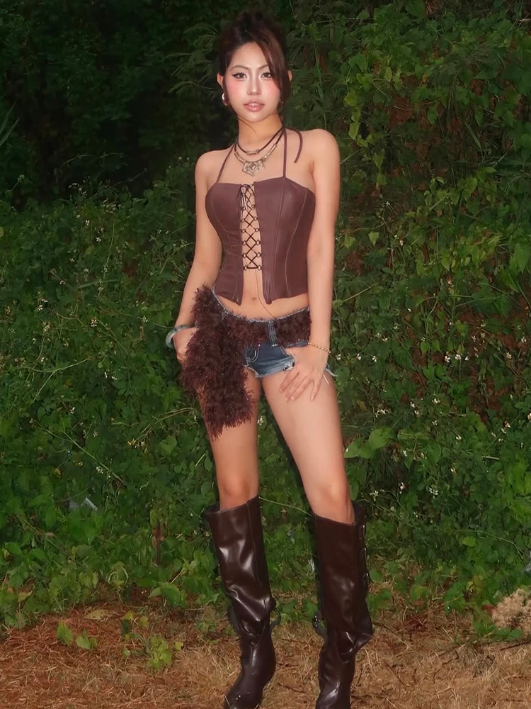 Whatiwear nieregularne Hollow seksowne podkoszulki damskie skórzane wiązanie krzyżowe Backless bez rękawów gorące dziewczyny północ dzika odzież klubowa