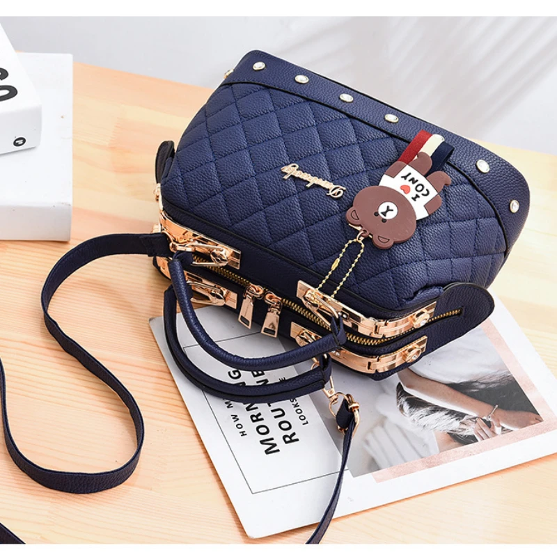 

Niche brand imitation leather spring 2024 new handbag steel clip diamond pillow bag shoulder crossbody bag quality assurance