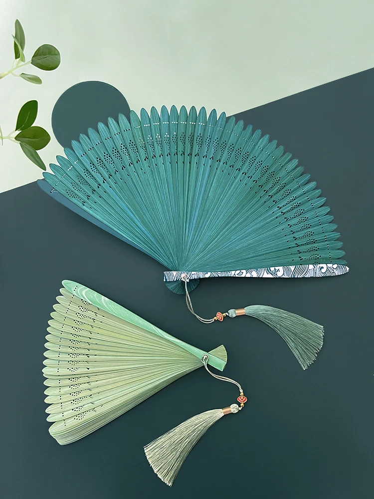 The product can be customized. Chinoiserie all bamboo fan small fish shape hollow out summer small portable antique folding fan