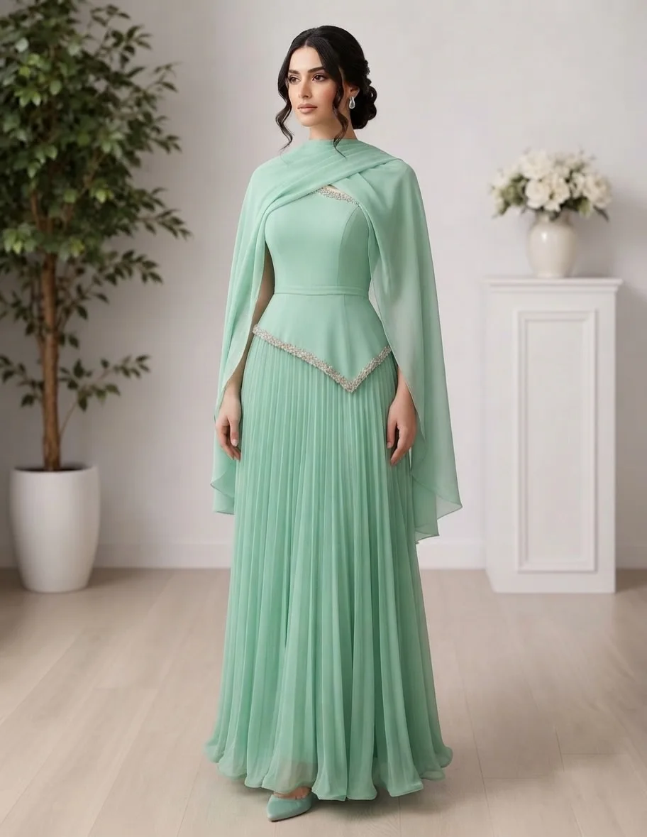 Mint Green Two Piece Modest Evening Set High Mock Neck Integrated Flowing Cape Sleeves Chest & Hem Crystal Rhinestone Border Tri