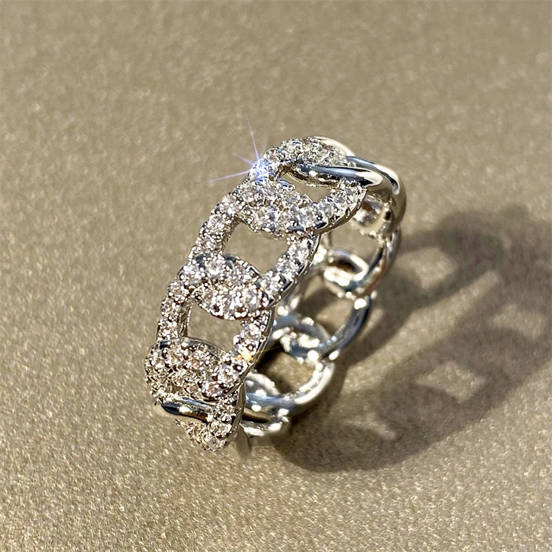 Huitan Fingerringe mit verbundenem Design für Frauen, voll mit schillerndem Zirkonia, Statement-Stil, weibliche Hochzeitsaccessoires, Schmuck