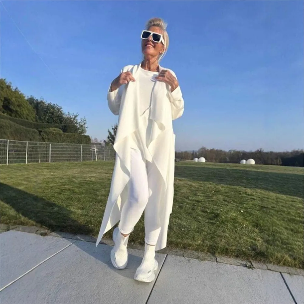 เสื้อแจ็คเก็ตลำลองแบบใหม่ปี 2025 เสื้อโค้ทเทรนช์ยาวแฟชั่น เสื้อคลุมคาร์ดิแกนสีพื้นแขนยาว เสื้อคลุมทรงไม่สมมาตร เสื้อแจ็คเก็ตฤดูใบไม้ร่วงสำหรับผู้หญิง