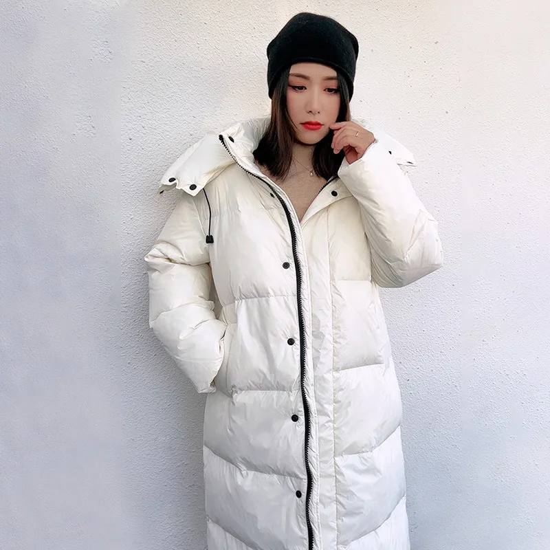Long length large size down jacket women\'s new winter fashion version of loose and thick warm hooded white duck down coat