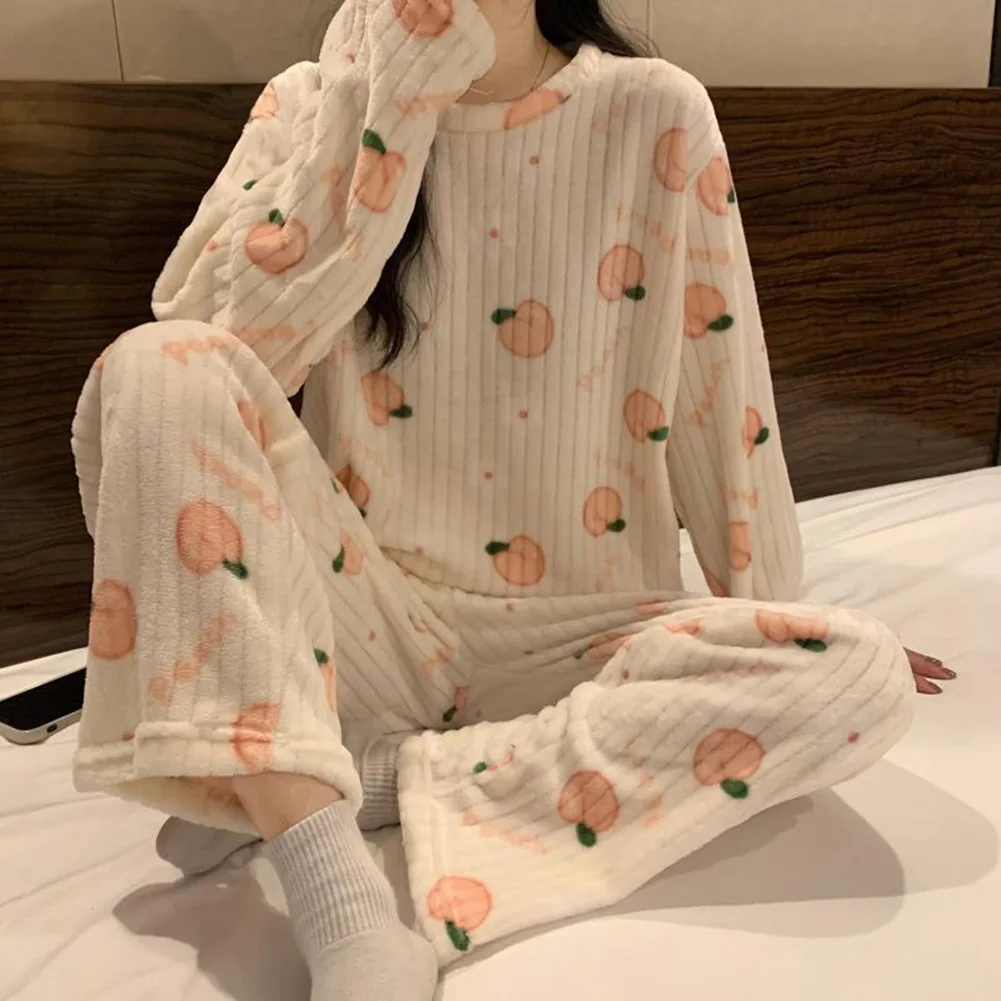 

Stylish Flannel Pajama Sets for Women Thick Fabric with Playful Peach Design Perfect for Cold Weather Comforts