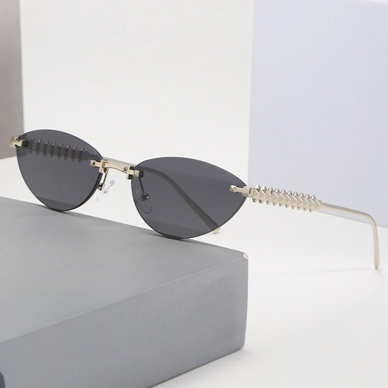 Neue Randlose Cat-Eye-Sonnenbrille mit Nieten für Damen 2025 Luxusmarke Ovale Verlaufsgläser Trendige Elegante Einzigartige Brillen