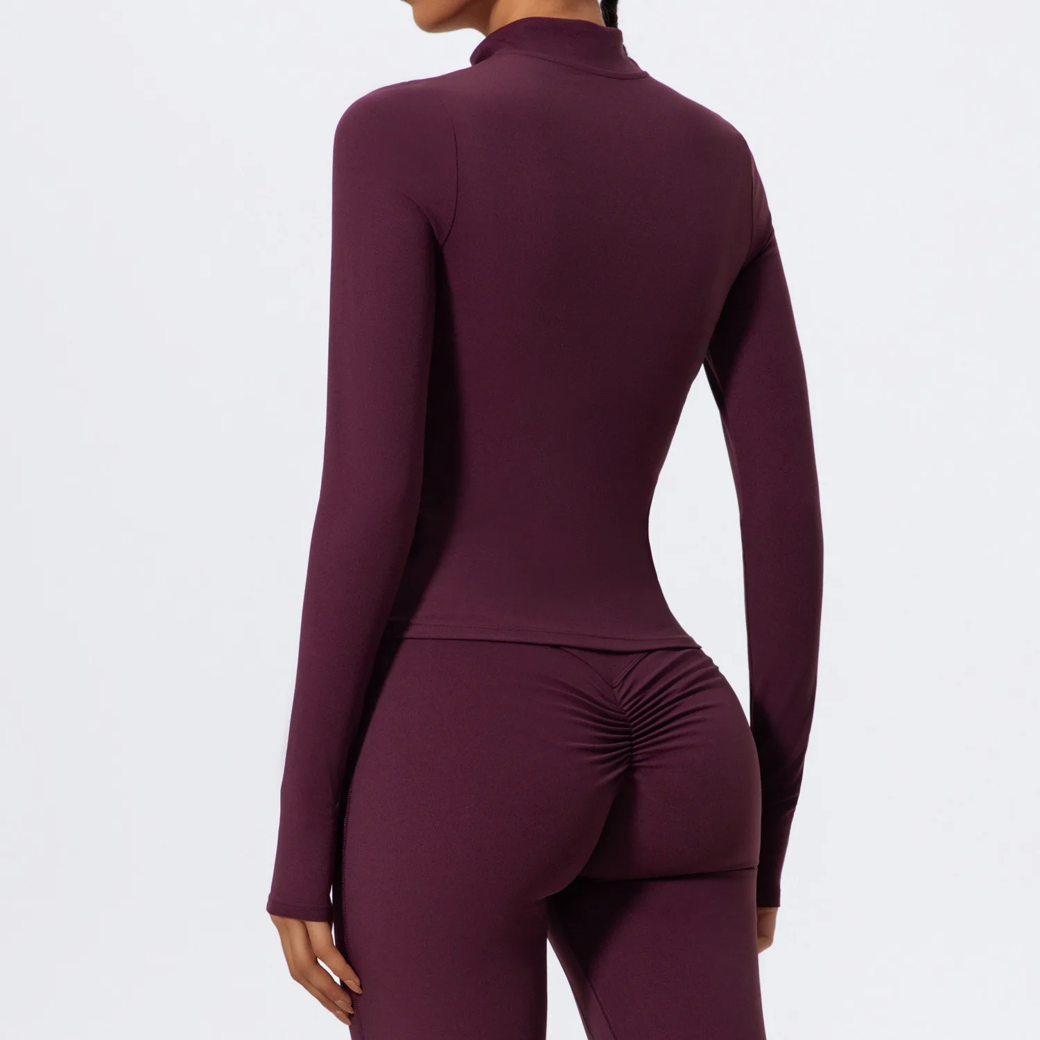 ชุดโยคะแขนยาวทรงเข้ารูปแบบซิปครึ่งตัว ยี่ห้อ Lezyan Sports เหมาะสำหรับใส่ออกกำลังกายกลางแจ้ง วิ่ง และฟิตเนส ให้ความอบอุ่น