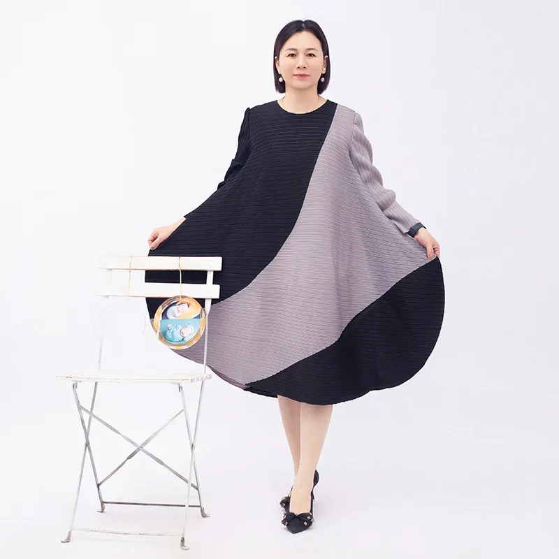 Color blocked round neck long sleeved irregular plus size women's dress